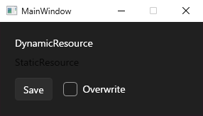 Dark へ切り替えた後の MainWindow。背景とボタンは暗く、DynamicResource のテキストは白に変わったが、StaticResource のテキストは Light 用の暗い色のまま残り、暗い背景の上でほとんど読めない
